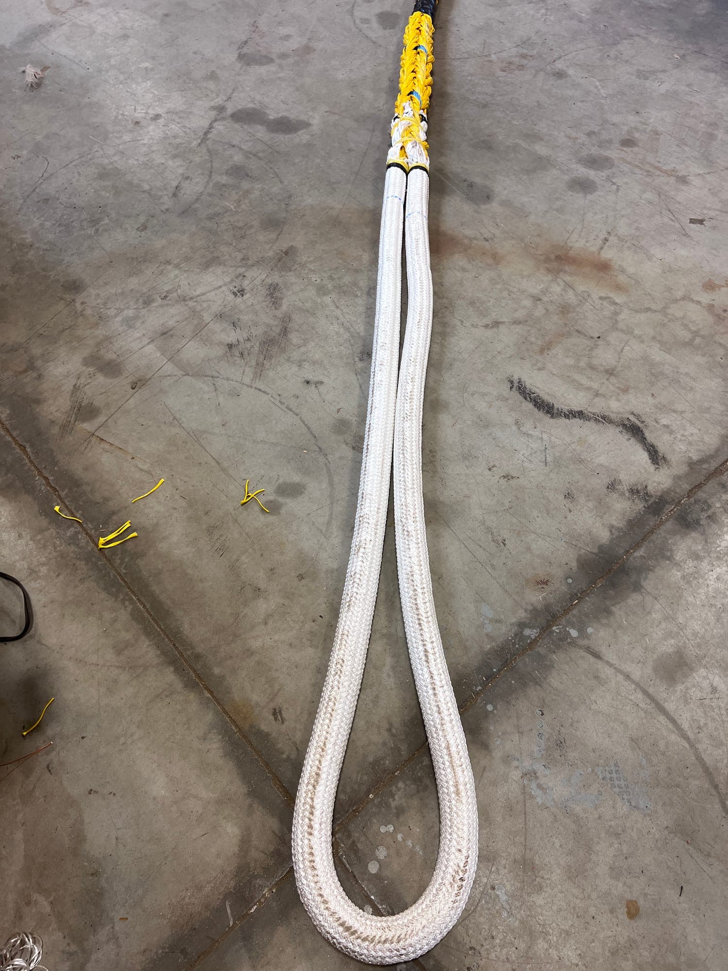 A long covered soft eye in double braid, the protective sleeve whipped off at the throat